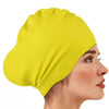 A bright yellow silicone swim cap worn on a woman's head, shown in profile.