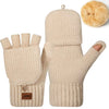 Beige knit gloves with a fluffy pom-pom on the thumb and a brown tag.