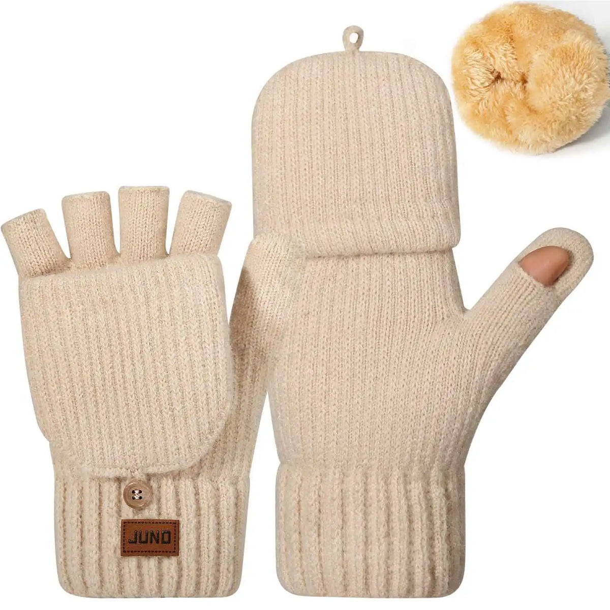 Beige knit gloves with a fluffy pom-pom on the thumb and a brown tag.