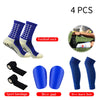 A set of four football socks, sport bandages, shin pads, and shin guard socks for sports injuries.
