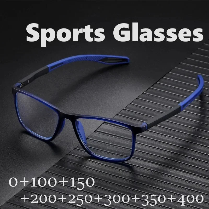 A pair of blue-framed sports glasses resting on a dark surface with various lens power options listed below.