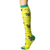 Yellow compression socks with green trim featuring black animal print designs.