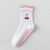 Chaussettes de yoga blanches avec broderie rose et détails antidérapants