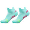 A pair of light blue cycling and running socks with pink and white patterns.