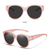 Pink round sunglasses shown from the front and a 45-degree angle.