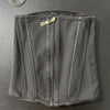 Corset de gainage noir et sans coutures avec fermeture éclair.