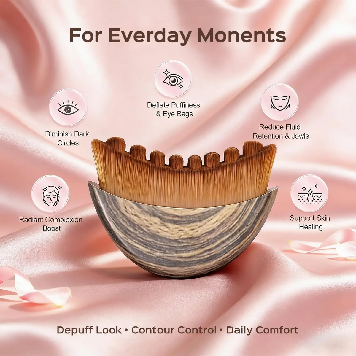 A wooden lymphatic contour face brush with a stone storage case shown against pink fabric.