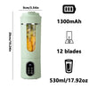 A light green portable electric juicer with a clear container and control panel.
