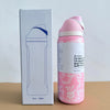 A pink insulated sports water bottle with a white label and a matching box.