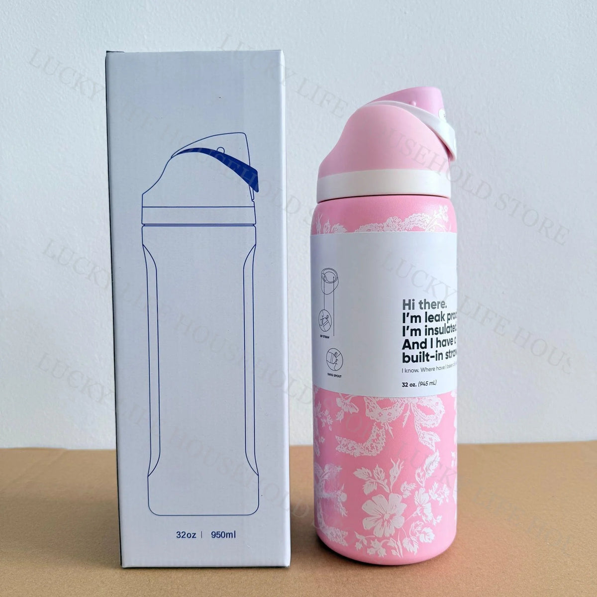 A pink insulated sports water bottle with a white label and a matching box.