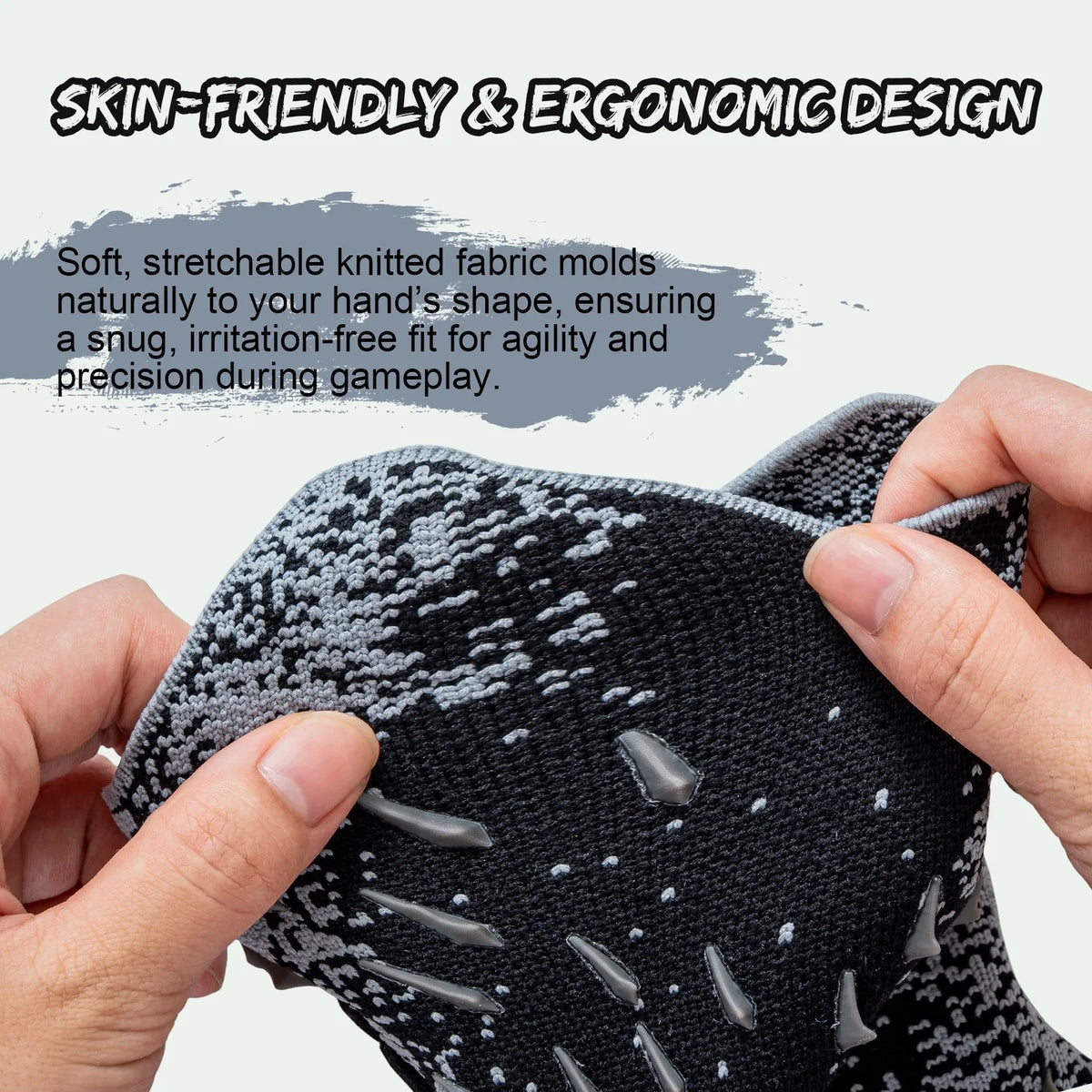 A hand is holding a black knitted glove designed to mold to the hand for improved grip and precision.