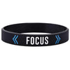 Black silicone wristband with the word FOCUS printed in white and blue arrows