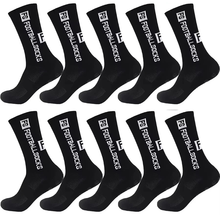 A set of black anti-slip silicone grip football socks displayed flat.