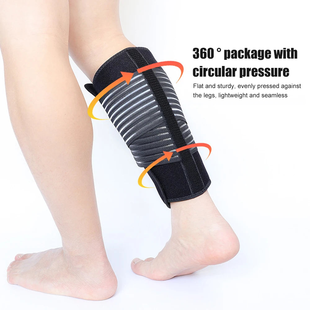 Black adjustable calf compression brace wrapped around a person's lower leg.