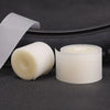 Rolls of bicycle puncture protection liner placed on a dark surface.