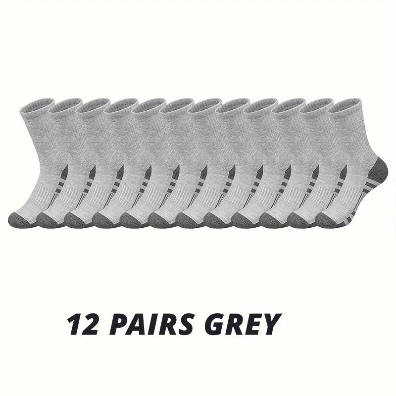 A row of twelve pairs of grey men's outdoor gym football socks laid out horizontally.