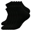 A stack of black men's essential warm socks for outdoor activities.