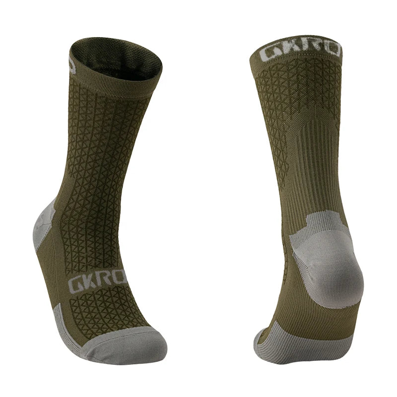 A pair of olive green cycling socks with gray accents shown from the side.