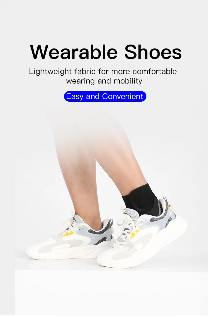 A person wearing white and gray lightweight wearable shoes, showing a side view of the footwear.