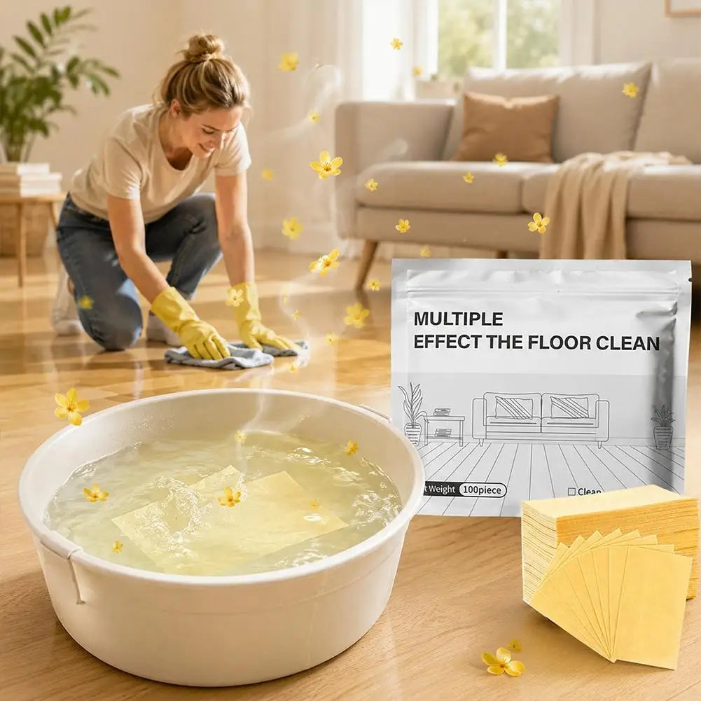 A woman is cleaning a floor with liquid from Aroma Floor Cleaning Tablets in a white bowl.