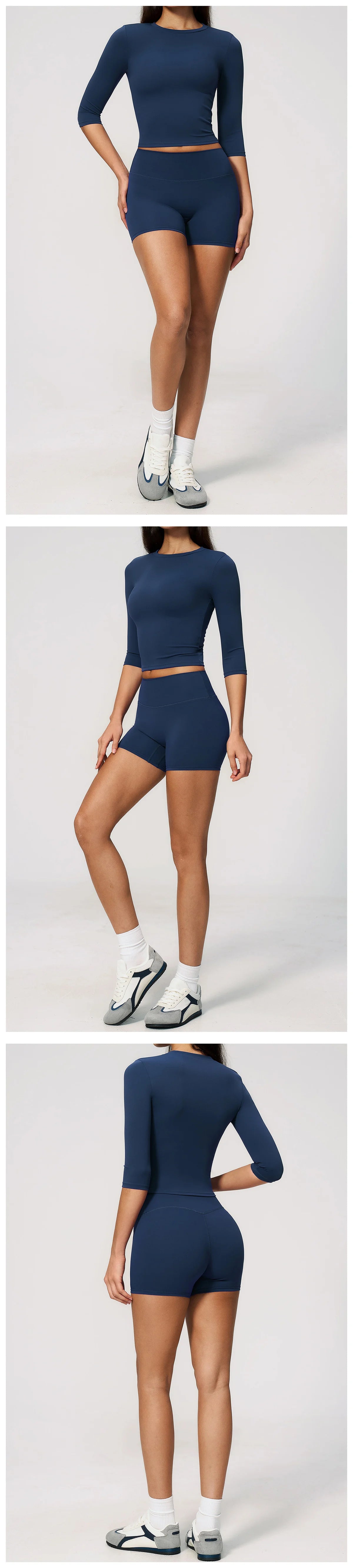A woman models a navy blue yoga and fitness leggings set, featuring long-sleeved tops and high-waisted bottoms.