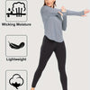 A woman models a gray loose fit sun protection t-shirt and black leggings, highlighting features like wicking moisture, light