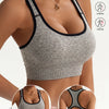 A gray seamless racerback sports bra set shown on a model, with options for yoga, camping, and hunting activities.
