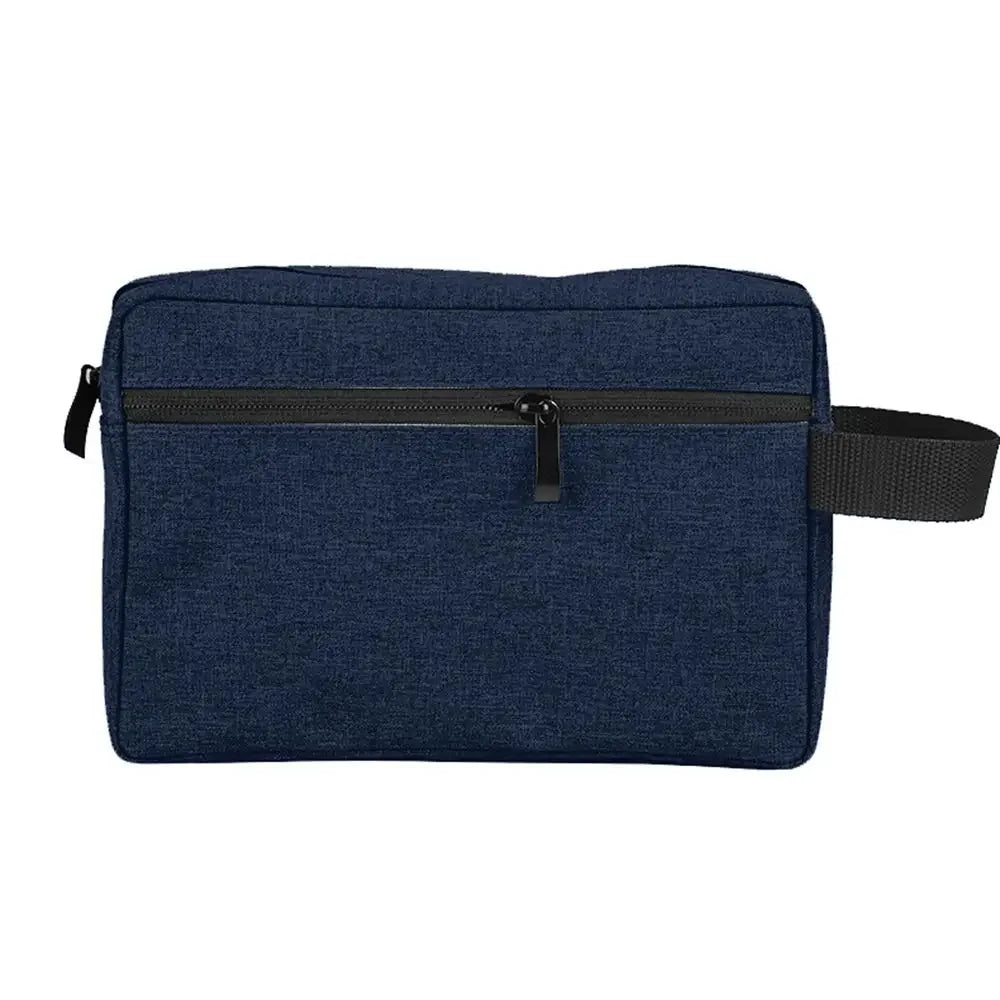 Navy blue waterproof cosmetic and travel pouch with a black zipper and strap