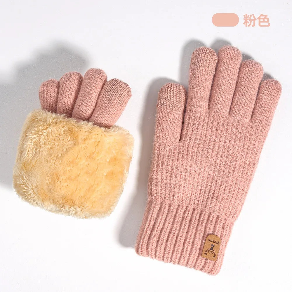 A pair of pink knit thermal gloves with a fluffy beige cuff shown against a white background.