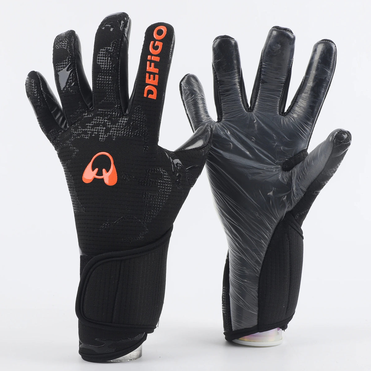 A pair of black Defigo professional football goalkeeper gloves displayed against a white background.