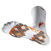 A close-up view of a white athletic sock with orange and gray patterned designs.