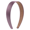 A pair of solid satin hair bands in mauve and brown.