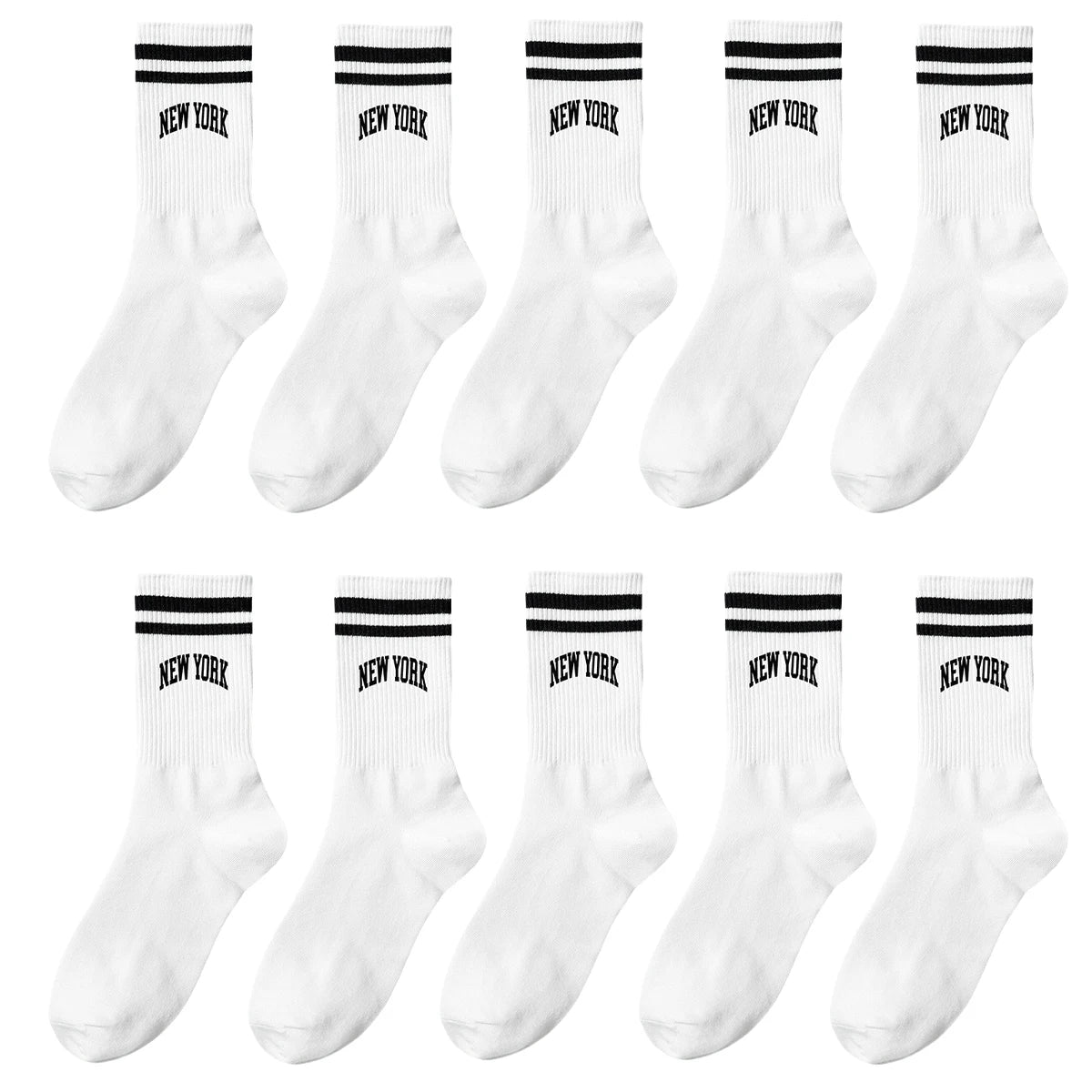 A set of white crew socks featuring black lettering that reads NEW YORK