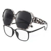 A pair of tortoiseshell leopard print sunglasses and clear prescription glasses displayed on a white background.