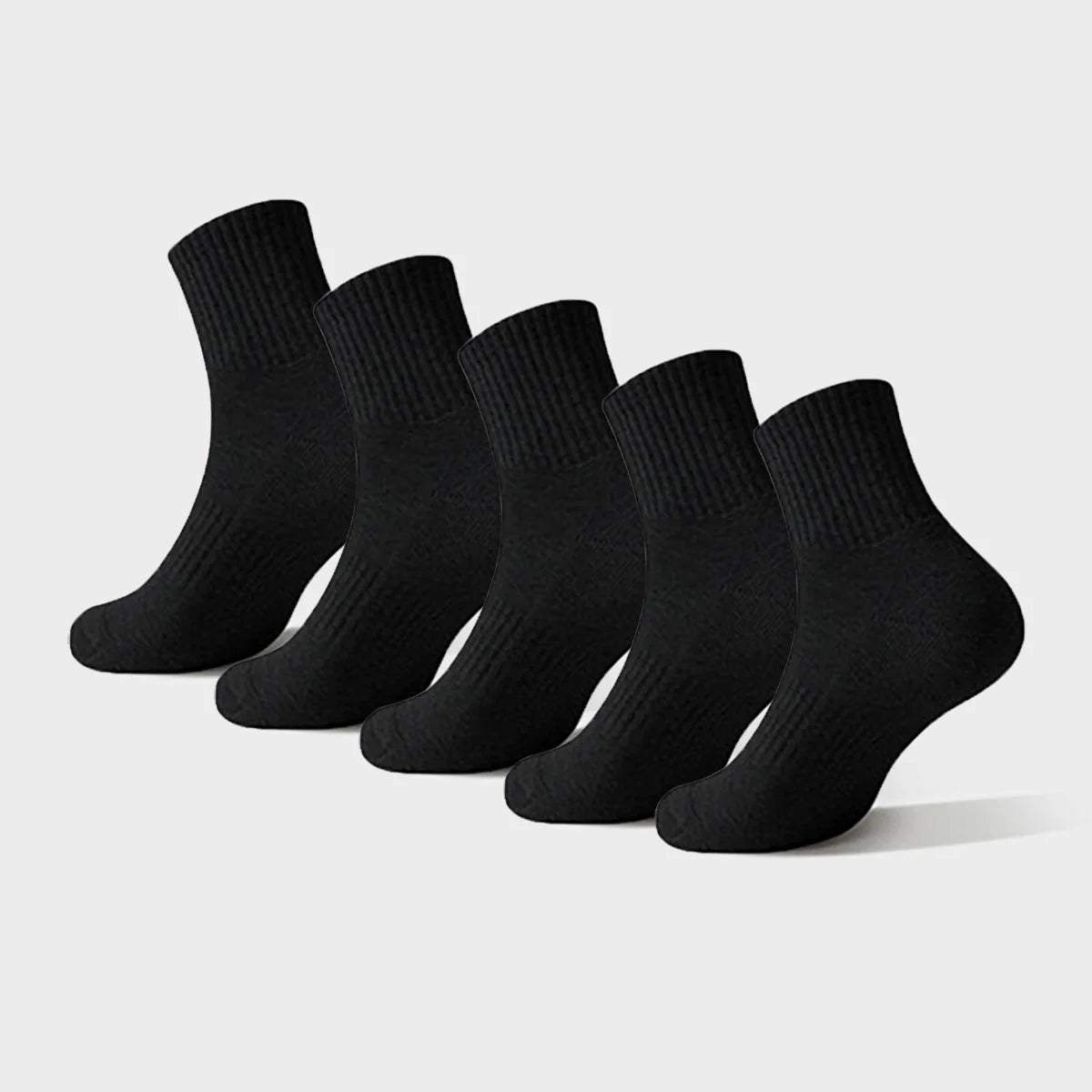 A stack of black ribbed crew socks for men and women displayed against a light background.