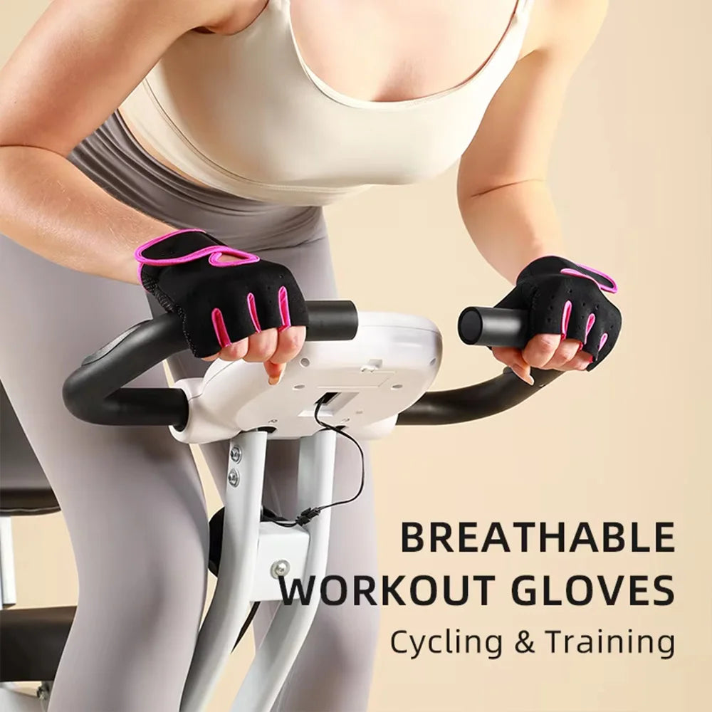 A person wearing black workout gloves is gripping a bicycle handlebar during a workout.
