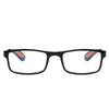 Black folding reading glasses with orange temple tips