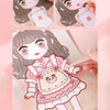 Un set de pegatinas de caras de dibujos animados reutilizables con una niña de cabello gris largo y ropa rosa.