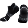 A pair of black classic crew socks for men, shown from the side.