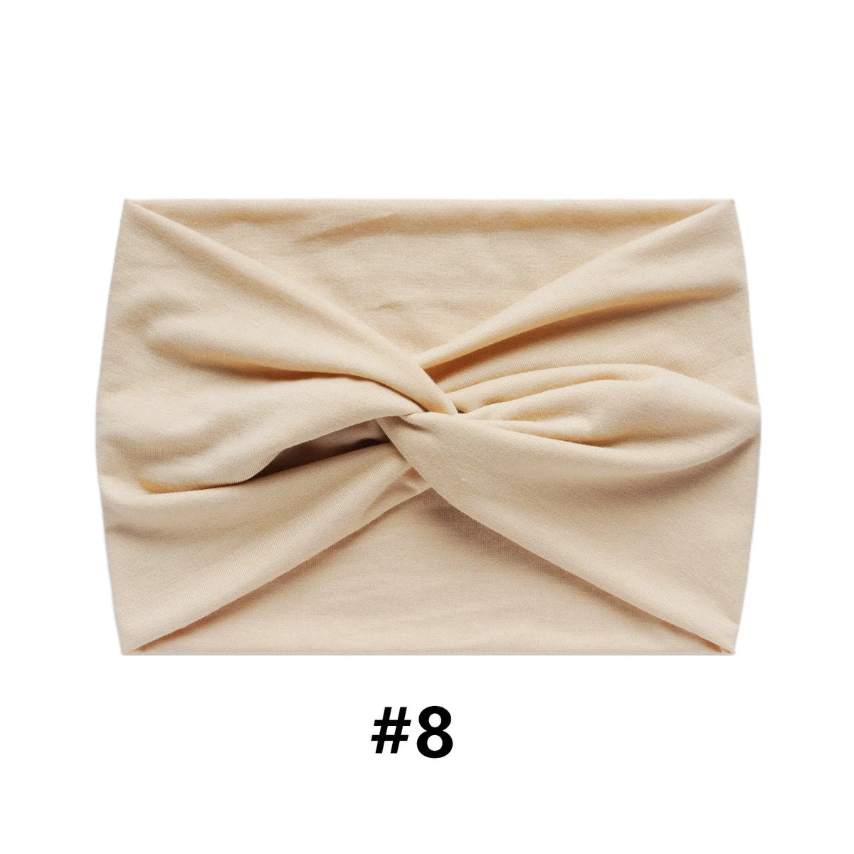 A beige boho wide turban headband folded and displayed on a white background.