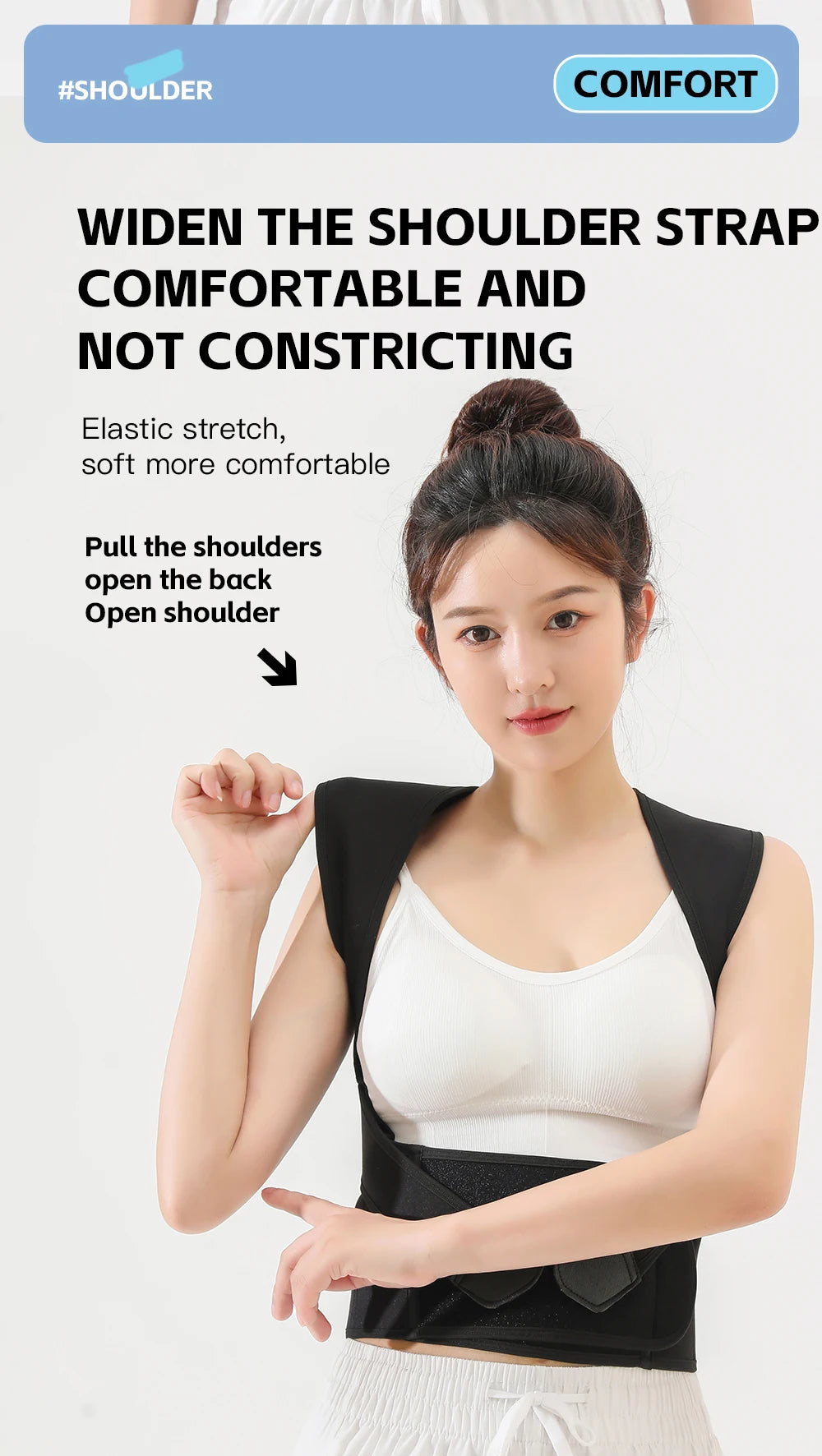 A woman demonstrates widening the shoulder strap of a black posture back brace for comfort and support.