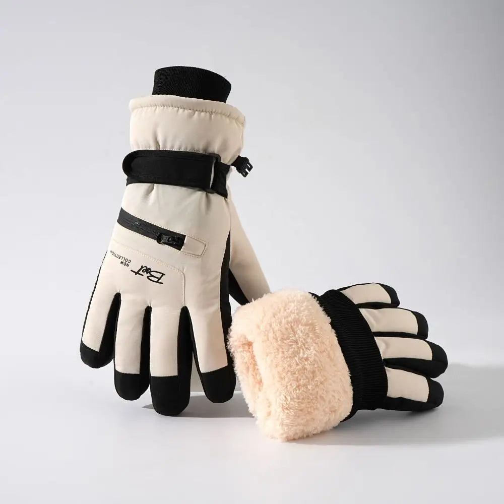 A pair of beige and black thermal winter ski and riding gloves with a cuff and zippered pockets.