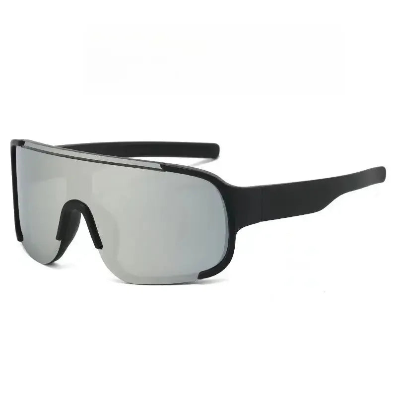 Gray sports sunglasses with black frames shown against a white background.