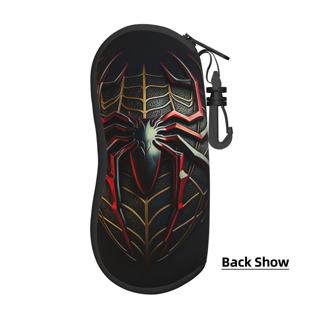 A black pouch featuring a detailed red and gold spider web design with a stylized spider head, complete with a black strap.