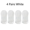 Four pairs of white non-slip yoga socks displayed side by side.