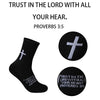 Black sports socks with a white cross design and text Trust in the Lord with all your heart Proverbs 3:5