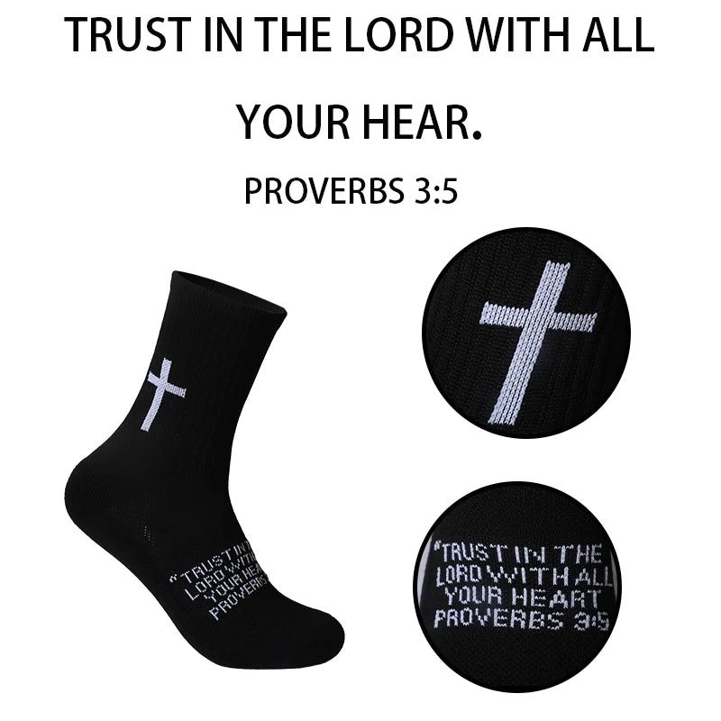 Black sports socks with a white cross design and text Trust in the Lord with all your heart Proverbs 3:5