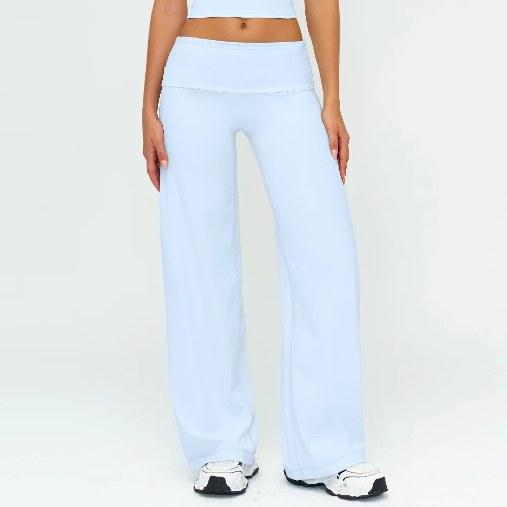 Light blue flared high-waist yoga pants worn by a person.