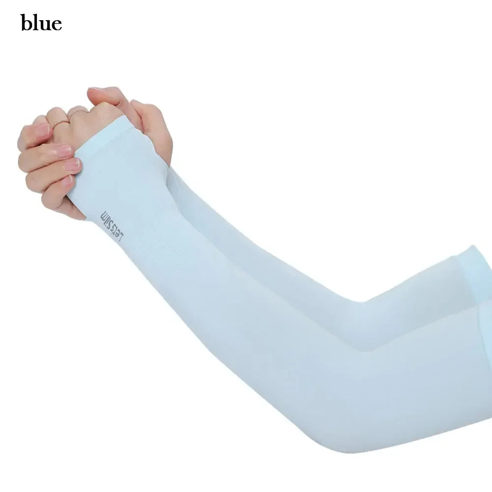A hand is wearing a light blue arm sleeve for sun protection.
