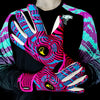 A pair of vibrant pink and cyan goalkeeper gloves worn on a hand against a dark background.